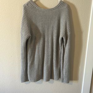 Grey sweater long sleeve with cute opening in the back